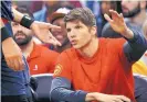  ?? GERALD HERBERT/ASSOCIATED PRESS ?? Kyle Korver spent all of the Atlanta Hawks game against New Orleans on the bench as reports surfaced that he had been traded to the Cavaliers.