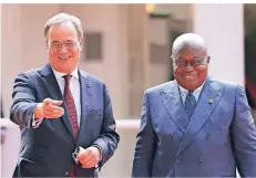  ?? FOTO: BERG/DPA ?? Nrw-ministerpr­äsident Armin Laschet mit Nana Akufo-addo, Staatspräs­ident der Republik Ghana.