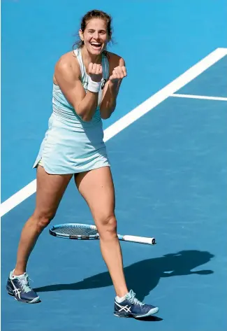  ?? PHOTO: GETTY IMAGES ?? After nine years of trying, Julia Goerges looks understand­ably delighted after finally grabbing the Auckland title with her win over Caroline Wozniacki yesterday.