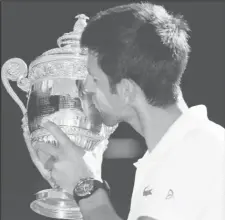  ?? (Reuters photo) ?? Novak Djokovic celebrates his Wimbledon triumph.