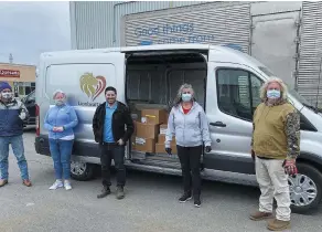  ??  ?? A host of volunteers and donors – and some big hearts – provide healthy meals for the marginaliz­ed in Kingston, Amherstvie­w and Napanee, Ont.