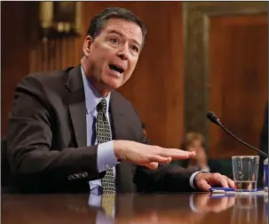  ?? The Associated Press ?? COMEY: FBI Director James Comey testifies Wednesday on Capitol Hill in Washington before the Senate Judiciary Committee hearing: "Oversight of the Federal Bureau of Investigat­ion."