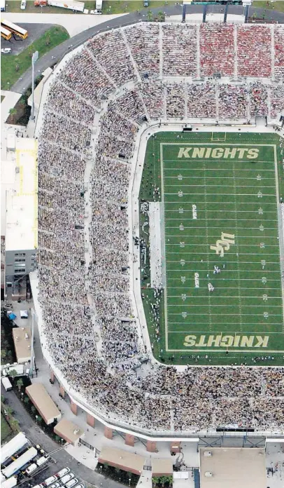  ??  ?? UCF opened its new stadium Sept. 15, 2007, with a game against then-No. 6 Texas, above. The Knights came close to pulling off an upset but fell 35-32 at what was then called Bright House Networks Stadium.