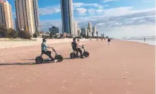  ??  ?? Gold Coast City Council wants to get tough on motorised scooters being on beaches and boardwalks.