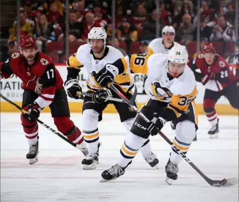  ?? Christian Petersen/Getty Images ?? Joseph Blandisi, right, has been part of 39 transactio­ns spanning three NHL teams.