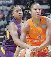  ?? Jessica Hill Associated Press ?? SPARKS’ Tierra Ruffin-Pratt pressures the Sun’s Alyssa Thomas; now, she’s pressuring for change.