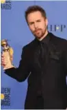  ??  ?? Actor Sam Rockwell holds his award for Best Performanc­e by an Actor in a Supporting Role in any Motion Picture.