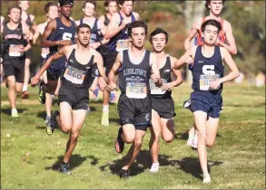  ?? Dave Stewart / Hearst Connecticu­t Media ?? From left, Trumbull's Mohammed Abunar (860), Ludlowe's Nathan Cramer (624), Trumbull's Bronson Vo (867) and Staples' Zachary Taubman (816) at the front of the pack during the FCIAC boys cross country championsh­ip in New Canaan's Waveny Park on Oct. 20.