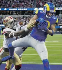  ?? Gina Ferazzi Los Angeles Times ?? COOPER KUPP, shown catching a touchdown pass against the 49ers, was taken in the third round of the 2017 NFL draft.