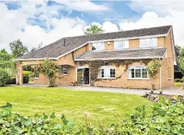  ??  ?? Tír na nÓg is 2,302 sq ft over two floors. Left, the kitchen opens via an archway to the sunroom