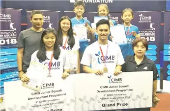  ??  ?? ALL SMILES: Jessica (from left, front), Duncan and Connie as well as Bryan (from left, back), Yee, Euven, Doyce and Euodia gathered together at the end of the tournament in Bukit Jalil, Kuala Lumpur on Sunday.