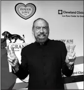  ?? SUN FILE (2017) ?? Philanthro­pist John Paul Dejoria poses on the red carpet for Keep Memory Alive’s 21st Annual Power of Love gala at the MGM Grand Garden Arena on April 27, 2017. Dejoria, co-founder of Paul Mitchell and Patron tequila, will be honored with Power of Love’s Community Leadership Award this year.