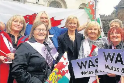  ??  ?? Members of the Bridgend and the valleys branch of national campaign Waspi (Women Against State Pension Inequality) took part in a Waspi protest outside the Houses of Parliament. The group is pictured with Baroness Glenys Kinnock