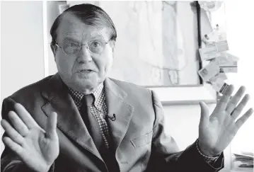  ?? JACQUES BRINON AP file ?? French scientist Luc Montagnier speaks during an interview in 2006 in Paris. The French researcher won the Nobel Prize in 2008 for discoverin­g HIV.