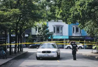  ?? THE CANADIAN PRESS ?? The Greektown area of Toronto that was a scene of a mass shooting Sunday is known as a hub for bustling patios and summer arts and food festivals.