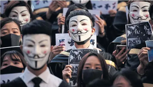  ?? NOEL CELIS AFP VIA GETTY IMAGES ?? Anonymous social media accounts are being used as a tactic to discredit the protest movement in Hong Kong and create a false consensus of informatio­n.