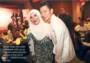  ?? ― IZZRAFIQ ALIAS/ The Star ?? Star of Hantu Kak Limah Delimawati with Lau at the party celebratin­g the success of the horror flick.