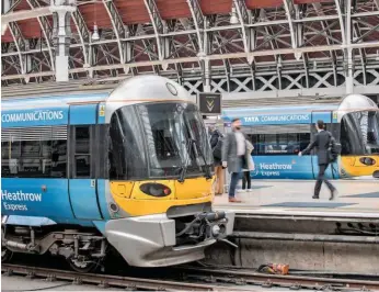  ?? JACK BOSKETT/ RAIL. ?? Travel is permitted using Rovers tickets on most open access operators’ services, but not Heathrow Express, steam services, Eurostar, London Undergroun­d or TfL Rail/Crossrail between Hayes & Harlington and Heathrow. Two Hex-operated Class 332s stand at...