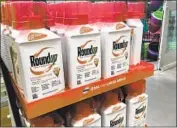  ?? Haven Daley Associated Press ?? BAYER MAY continue selling Roundup in the U.S. for backyards and farms without any safety warning.