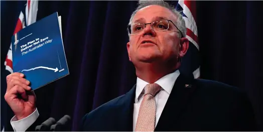  ?? ?? Le premier ministre australien Scott Morrison vient de s’engager à atteindre la neutralité carbone aussi vite que possible, de préférence d’ici à 2050. (Crédits : Reuters)