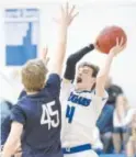  ?? Logan O’Brien, Loveland Reporter-Herald ?? Resurrecti­on Christian star Tanner Ervin averages 27 points per game.