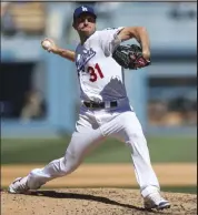  ?? Meg Oliphant / Getty Images ?? Mets pitcher Max Scherzer, seen playing for the Dodgers last season, is among the players who met with
MLB ownership on Friday as negotiatio­ns continue.