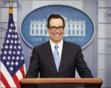  ?? PABLO MARTINEZ MONSIVAIS - THE ASSOCIATED PRESS ?? Treasury Secretary Steve Mnuchin smiles while speaking to the media during the daily briefing in the Brady Press Briefing Room of the White House in Washington, Monday.