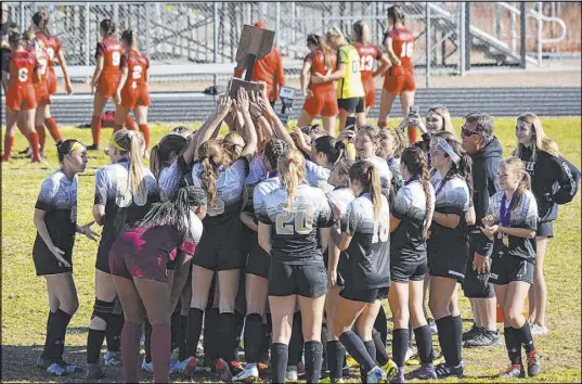  ?? Courtesy ?? The Faith Lutheran girls soccer team celebrates the school’s first Class 4A state championsh­ip after the Crusaders defeated Coronado 1-0 on Nov. 16 at Hug High School in Reno. Faith Lutheran won the Class 3A crown in 2015.