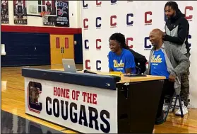  ?? Alex Wright Las Vegas Review-journal ?? Coronado’s Sebastian Mack smiles with his family by his side after announcing his decision to play college basketball at UCLA.