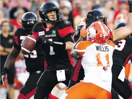  ?? JUSTIN TANG/THE CANADIAN PRESS ?? Ottawa Redblacks quarterbac­k Trevor Harris is “fine” after missing practice Tuesday ahead of Saturday’s meeting with the beefed-up Hamilton Tiger-Cats, who added former Redblacks Chris Williams and Jamaal Westerman as part of a trade with Montreal on Sunday.