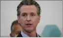  ?? NELVIN C. CEPEDA — THE SAN DIEGO UNION-TRIBUNE ?? Gov. Gavin Newsom speaks with news reporters at Park de la Cruz Recreation Center in San Diego on Friday.