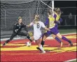  ?? RANDY MEYERS — THE MORNING JOURNAL ?? A shot on goal by Vanessa DiNardo of Strongsvil­le is stopped by Avon goalkeeper Maggie Beatty in 2017.