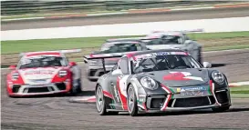  ??  ?? Al Faisal al Zubair (front) drives his car during the second round in Sakhir, Bahrain, on Friday