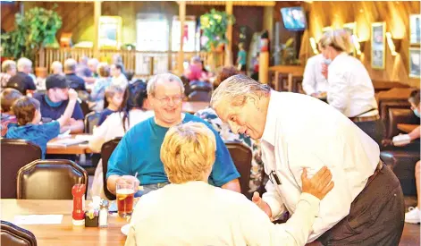  ??  ?? Ambrogi greets patrons at the restaurant his family has run since 1959.