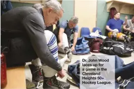  ?? TIM HARRISON ?? Dr. John Wood laces up for a game in the Cleveland Heights 50+ Hockey League.