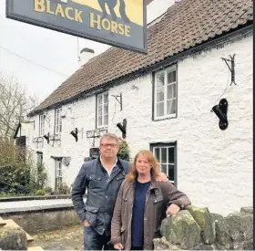  ??  ?? Landlords John Beynon and Allison Philp at the Black Horse, Clapton-inGordano; Below, a Christmas tree that regulars might never see in person