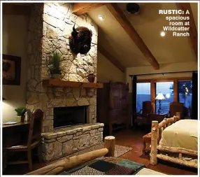  ??  ?? rUSTIC: A spacious
room at Wildcatter
Ranch