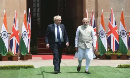  ?? Photograph:Sondeep Shankar/Pacific Press/REX/
Shuttersto­ck ?? ‘All heads of government use foreign visits to burnish their images, but Johnson feeds off the charisma of populist leaders to an unusual degree.’ Boris Johnson with Narendra Modi at Hyderabad House, New Delhi, 22 April 2022.