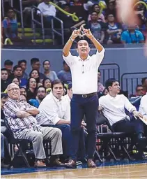  ?? PBA ?? MAGNOLIA MENTOR Chito Victolero (standing), whose charges have held pole position all along, stressed the playoffs are a whole new ballgame.