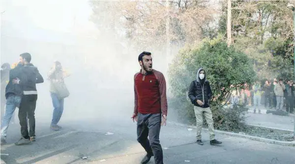  ??  ?? The protests began as demonstrat­ions against economic conditions in second city Mashhad on Thursday but quickly turned against the Islamic regime as a whole, with thousands marching in towns across Iran to chants of “Death to the dictator”.