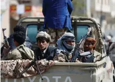  ?? Reuters ?? Houthis ride on the back of a truck as clashes with forces loyal to Saleh continue in Sanaa yesterday