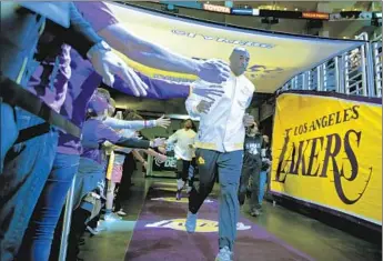  ?? Robert Gauthier
Los Angeles Times ?? KOBE BRYANT jogs onto the court at Staples Center before the Lakers’ game against the Indiana Pacers. On Sunday, he made his retirement announceme­nt in a 52-line poem titled “Dear Basketball.”