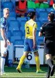  ??  ?? OFF DAY: Millen (left) is shown the red card by referee Dallas