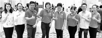  ??  ?? EduQuest Education Services Sdn Bhd director Datin SeriTan Kit Sher (fourth left) with her dedicated team at the EduQuest Roadshow yesterday.