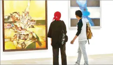  ?? AFP ?? Around 100 items of Iraqi contempora­ry art that had been pillaged after the US-led 2003 invasion are now on display in Baghdad after they were returned to the country and restored.