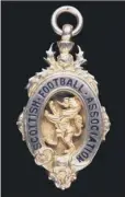  ??  ?? FOOTBALL HISTORY:Jock MacDougall’s Scottish Cup winner’smedal.