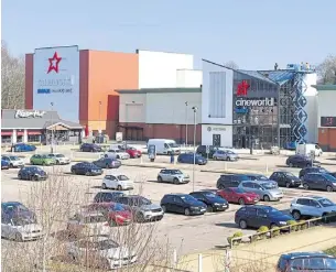  ?? Picture: Cineworld Ashford ?? Ashford’s IMAX screen is taking shape; right, how the frontage now looks, with the extension towering over Pizza Hut