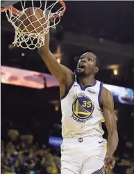  ?? Ben Margot / Associated Press ?? Kevin Durant scores for the Warriors against the Clippers in Game 1 of a first-round playoff series on April 13, 2019.