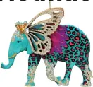  ??  ?? Neon Brights Fantasia Elephant Christmas Decoration, £7.50, Ella James.