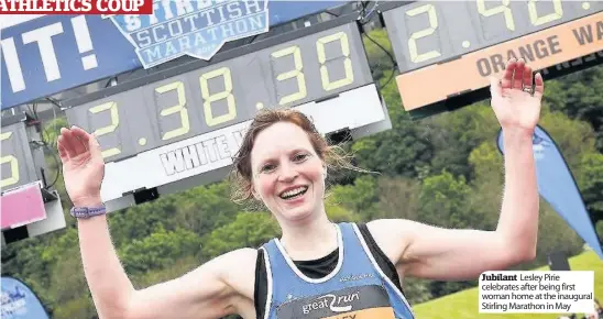  ??  ?? Jubilant Lesley Pirie celebrates after being first woman home at the inaugural Stirling Marathon in May